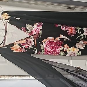 Beautiful dramatic arms flower jumpsuit! I LOVE THIS JUMPSUIT!!